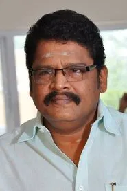 K. S. Ravikumar in Dragon